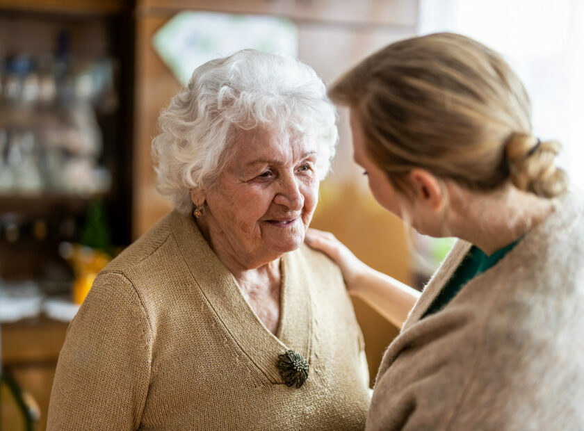 older adult and caregiver